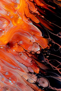 orange and black abstract painting