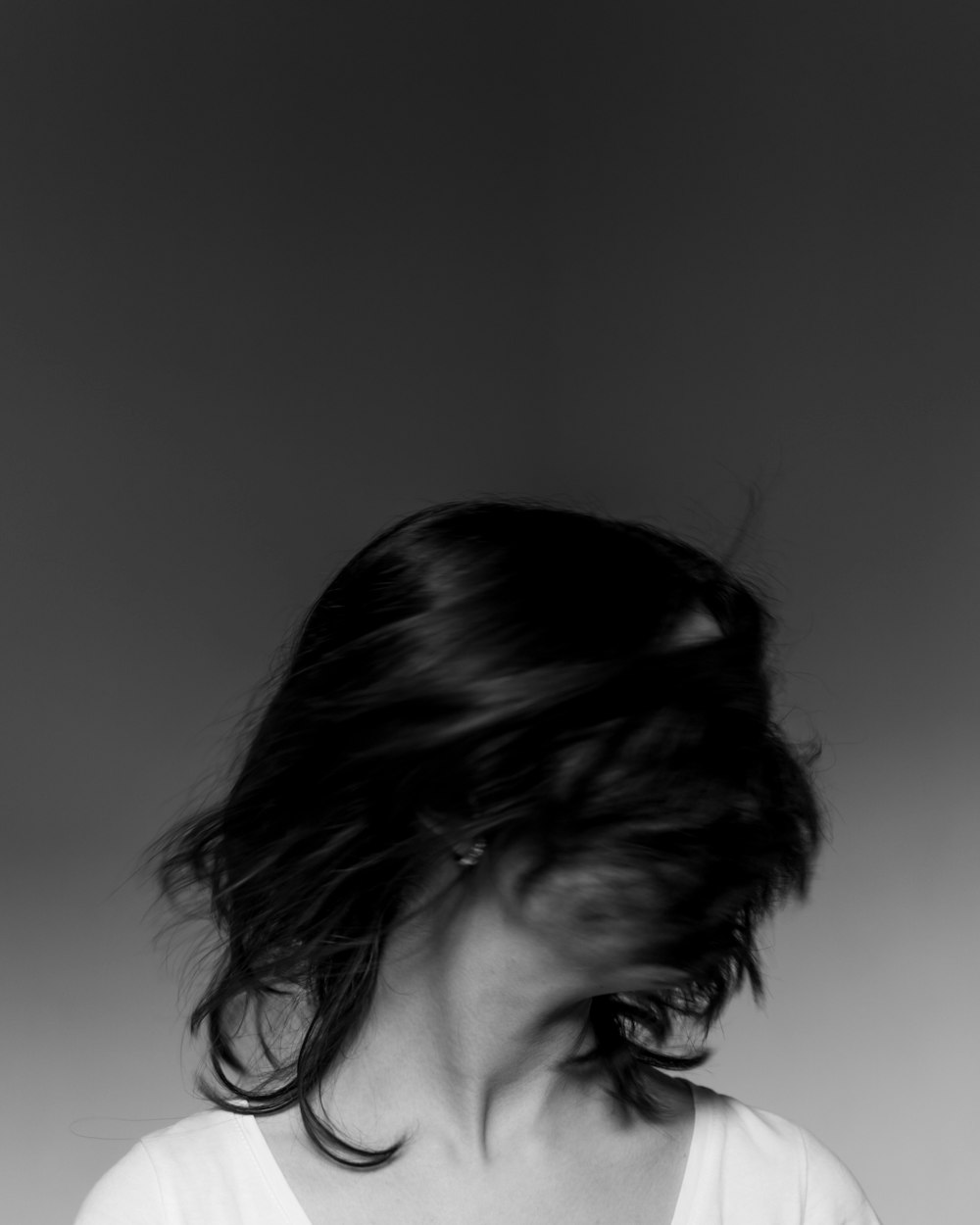 grayscale photo of womans face