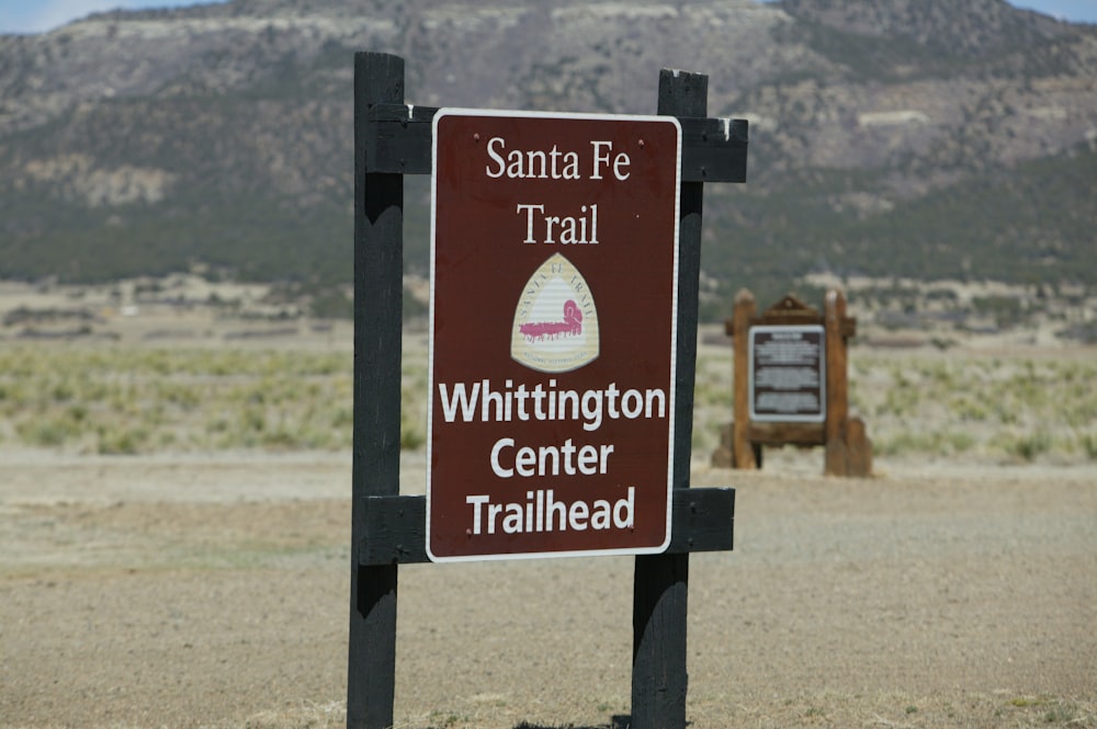 red and black wooden signage