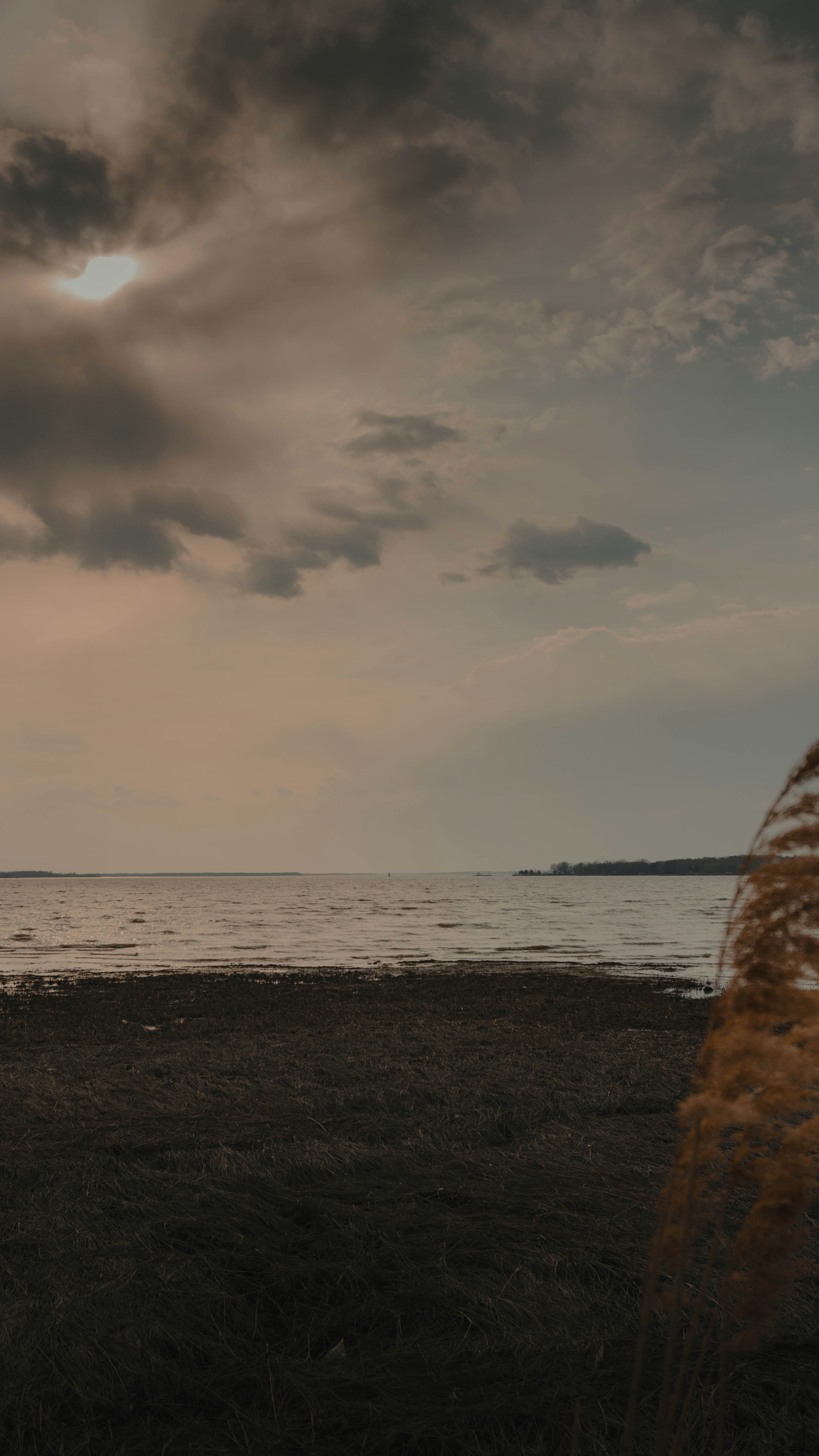 ocean under cloudy sky during daytime