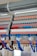 A detailed view of a terminal block with several rows of connections, featuring orange and grey components with numerous blue and white wires organized neatly. Each wire is labeled with a clear identification number. The photo captures the intricate layout and structured organization of electrical components.