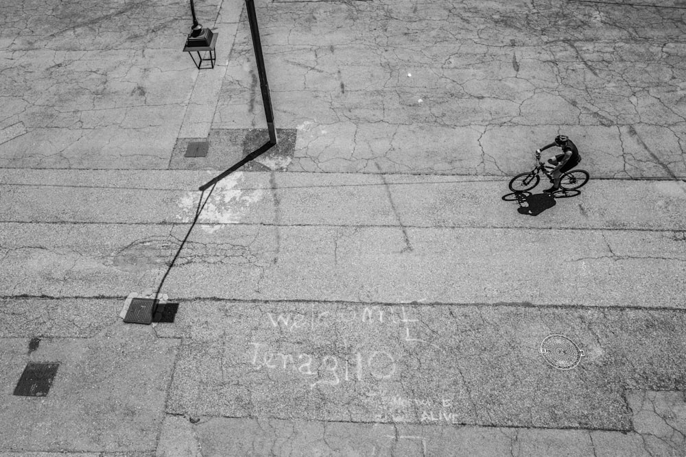 black bicycle on gray concrete floor