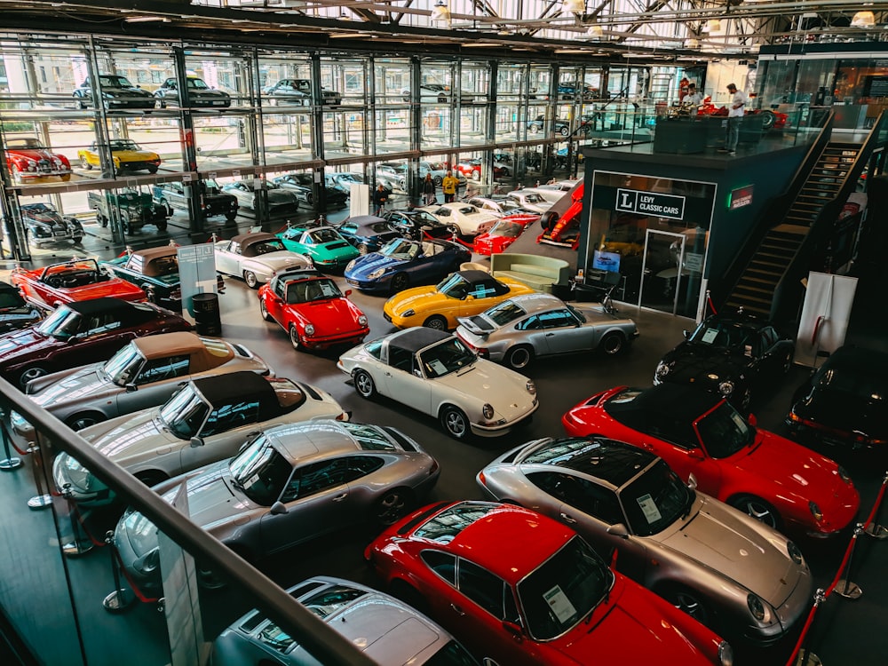 cars parked in front of building during daytime