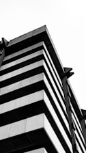grayscale photo of concrete building