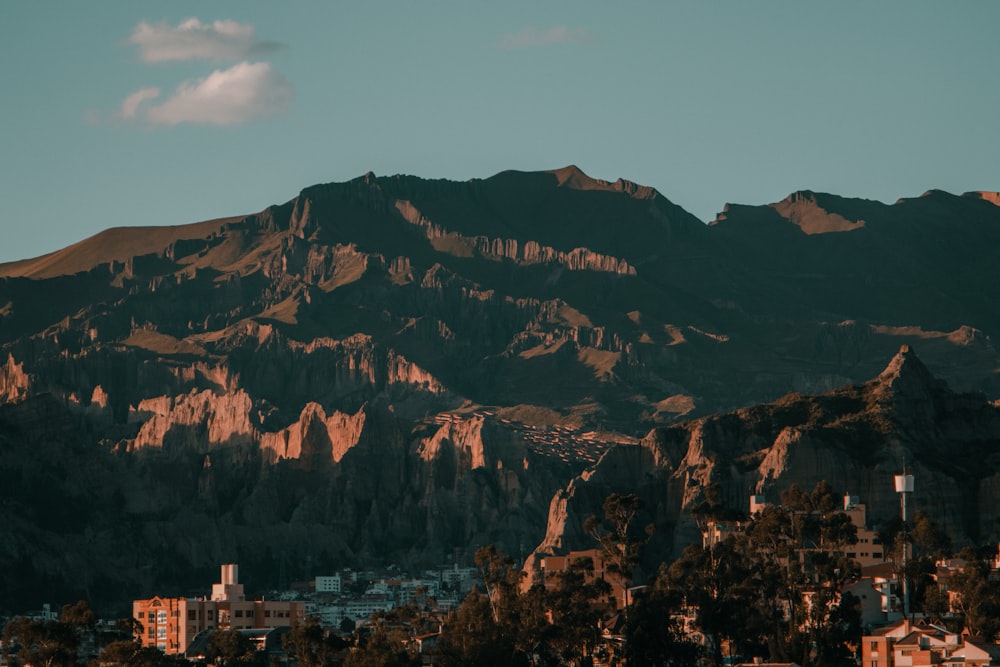 brown and white mountain under blue sky during daytime