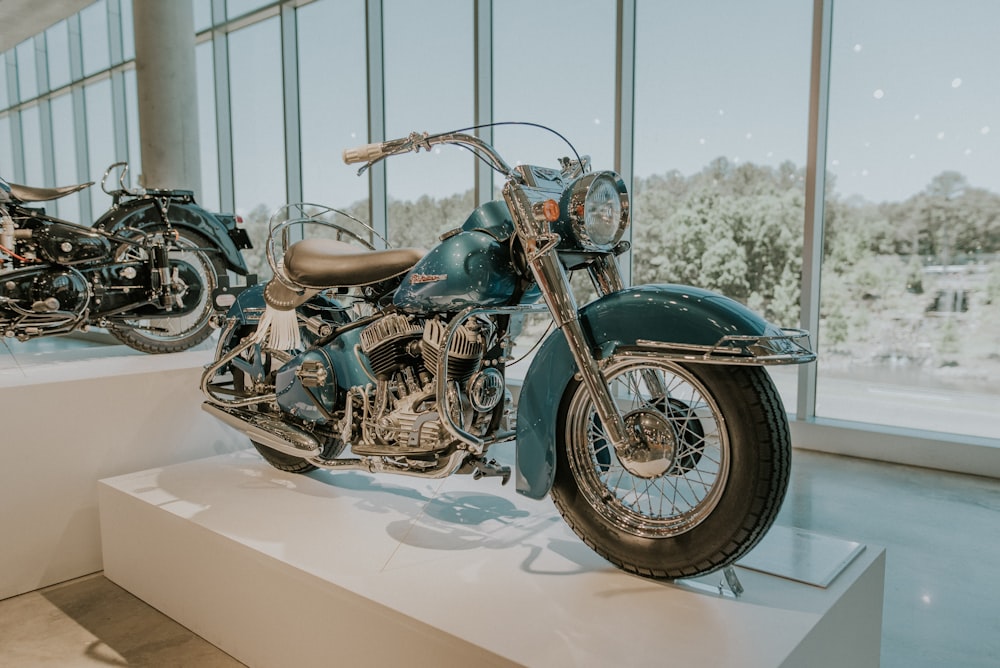 blue and black cruiser motorcycle