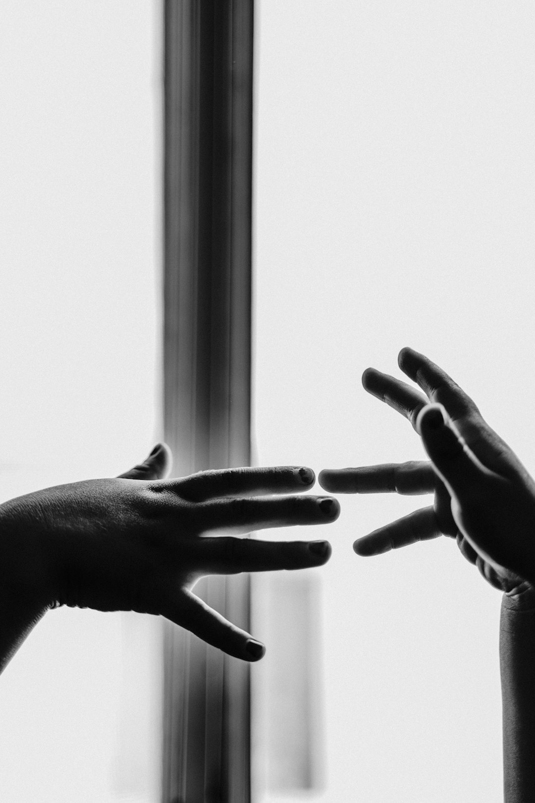 grayscale photo of persons hand