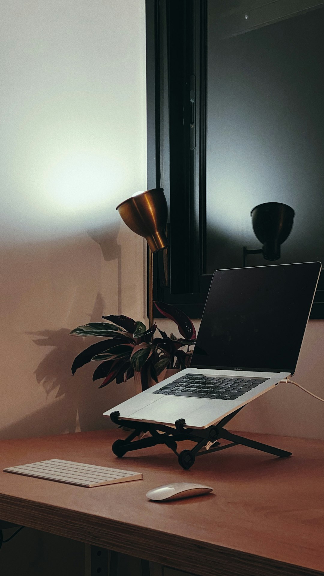 macbook pro on white table