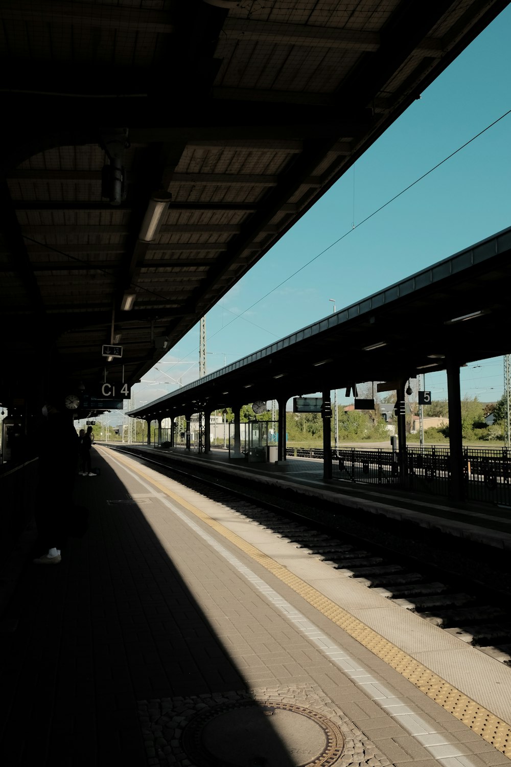 people walking on train station during daytime