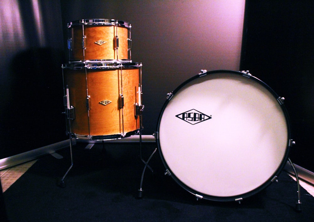 brown and white drum set