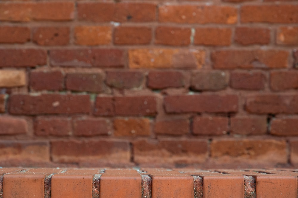 brown brick wall during daytime