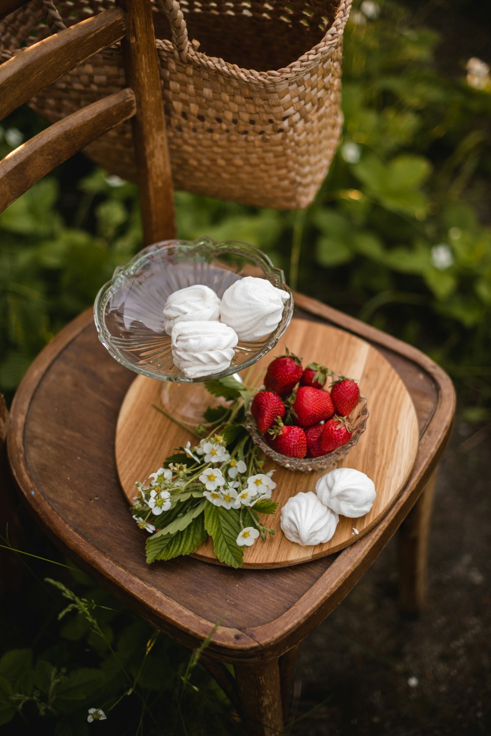 red and white roses on brown woven basket