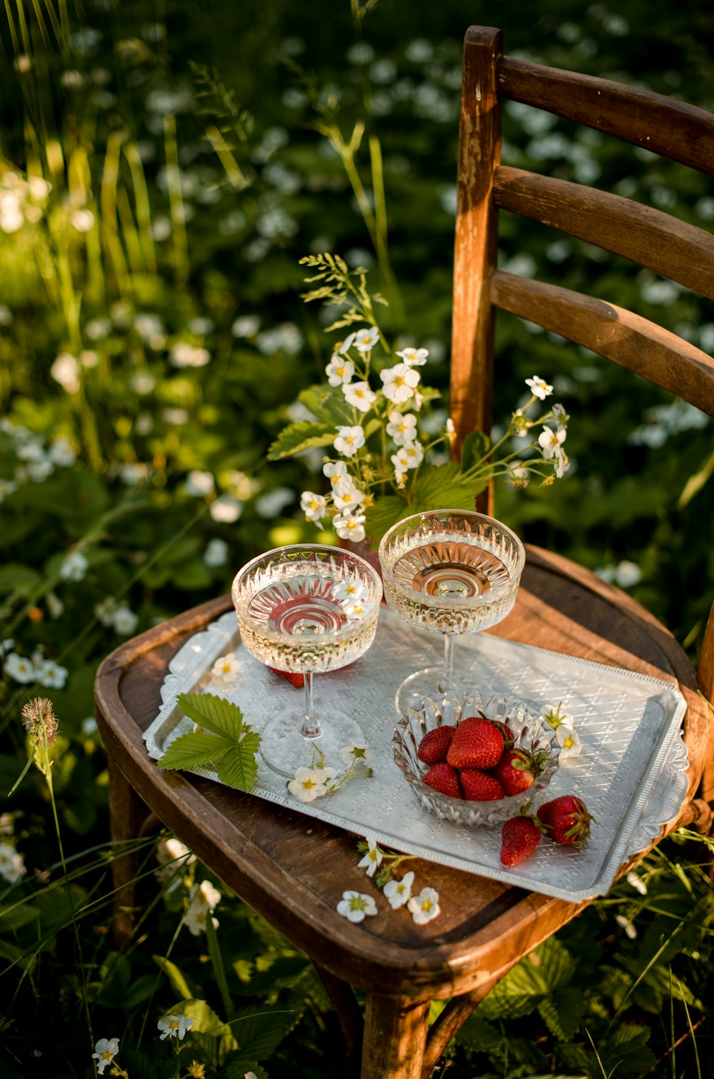 clear drinking glasses on brown wooden tray