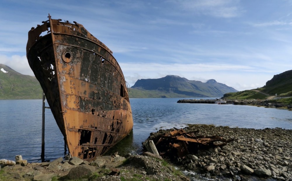 brown ship on sea during daytime