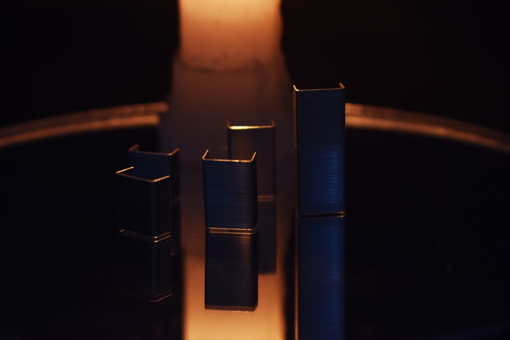 blue pillar candles on brown wooden holder