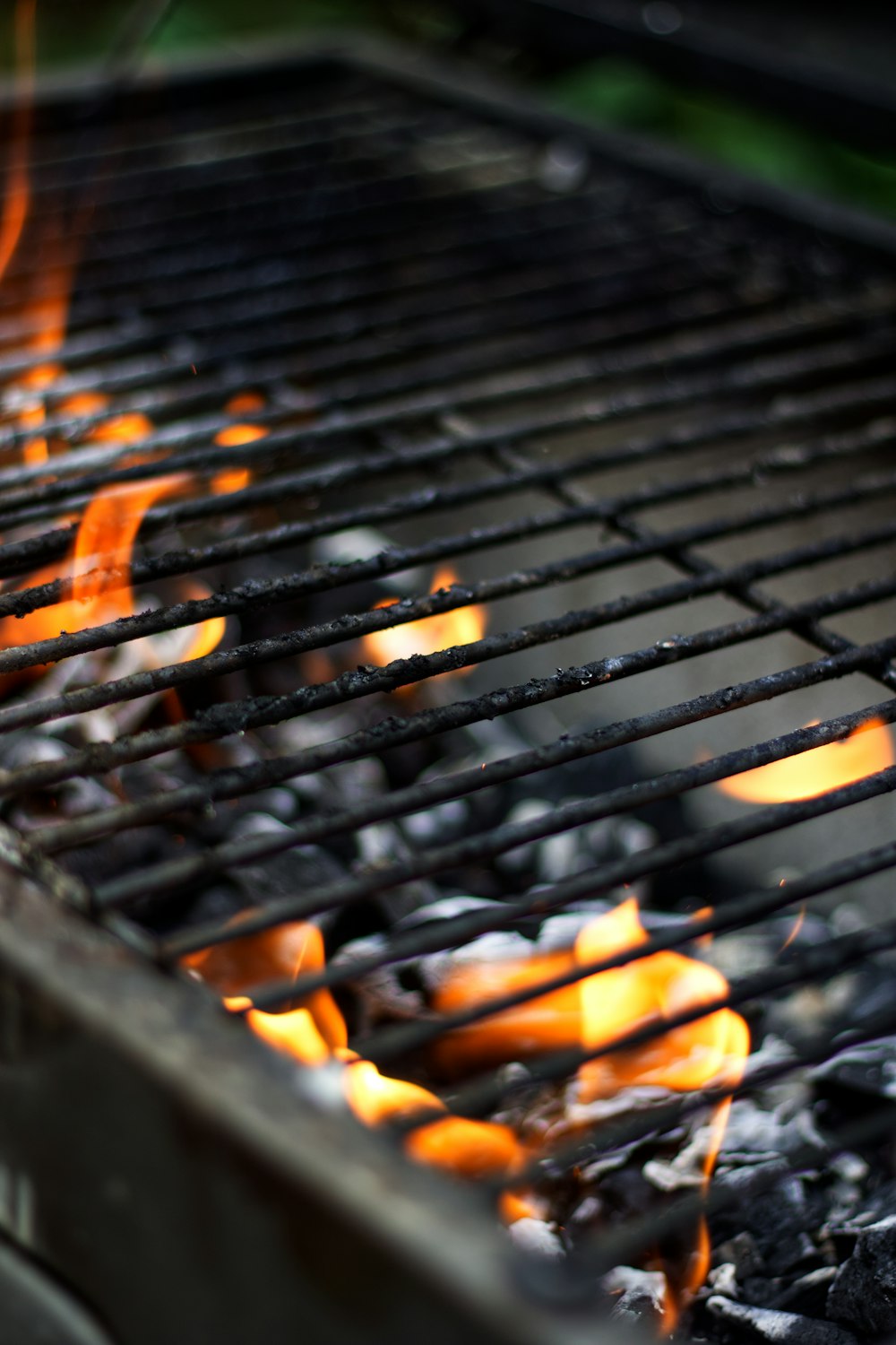 burning charcoal on charcoal grill