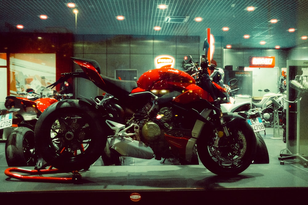 red and black cruiser motorcycle