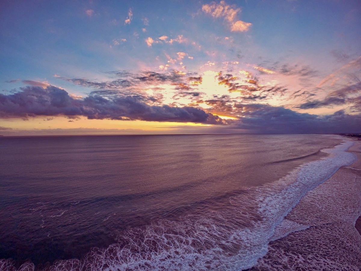 Sunset cocktail lounges and refined coastal dining along Seminyak Beach