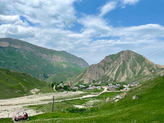 green and brown mountains under blue sky during daytime in Laza Azerbaijan