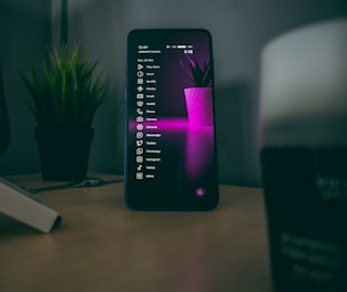 black android smartphone on white table