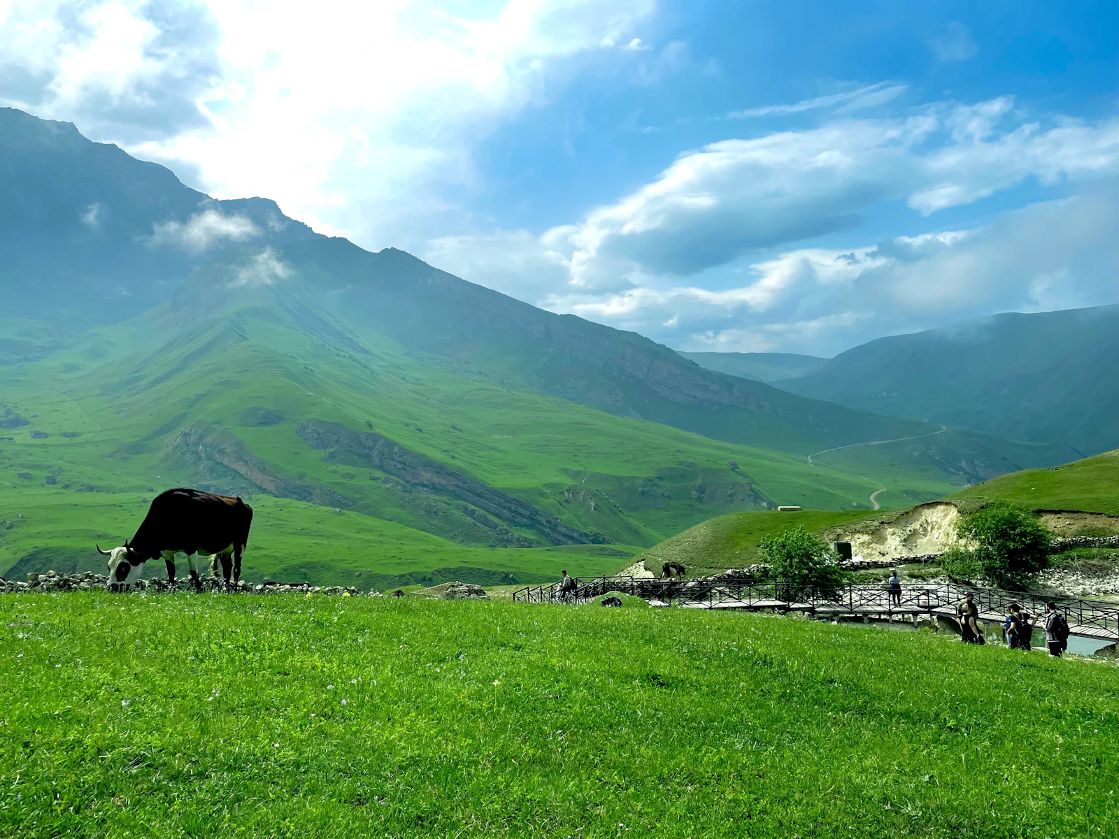 Green mountain slopes above Gabala under a cloudy sky