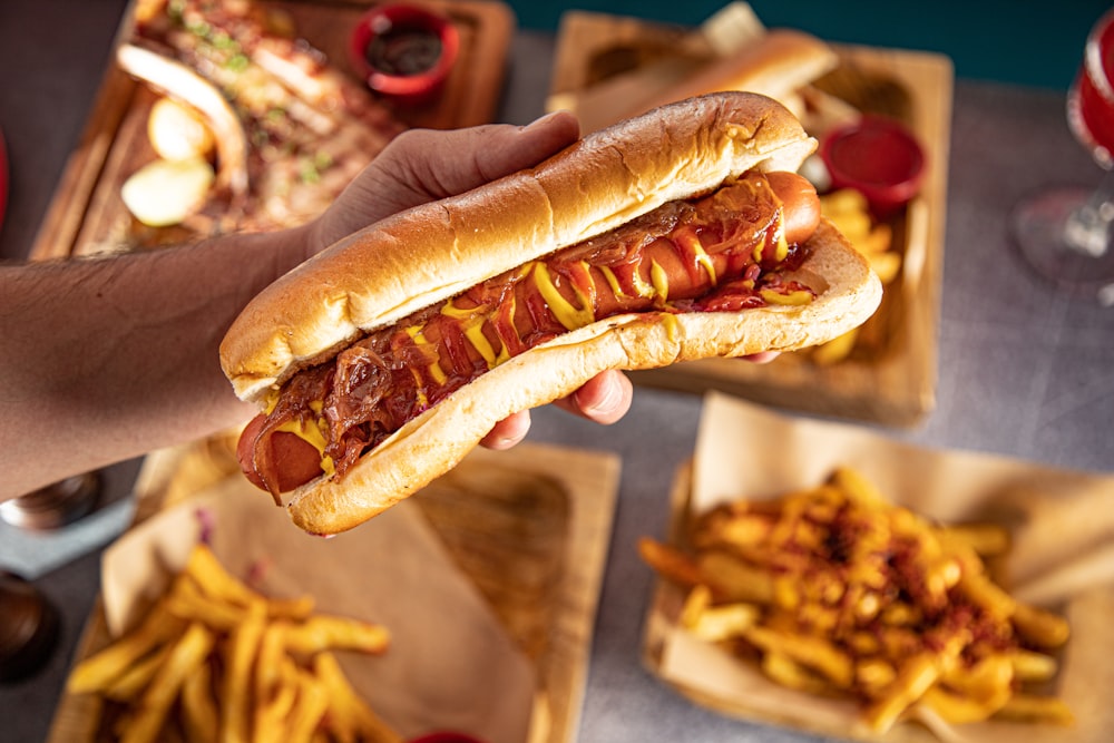 hotdog sandwich on brown wooden table