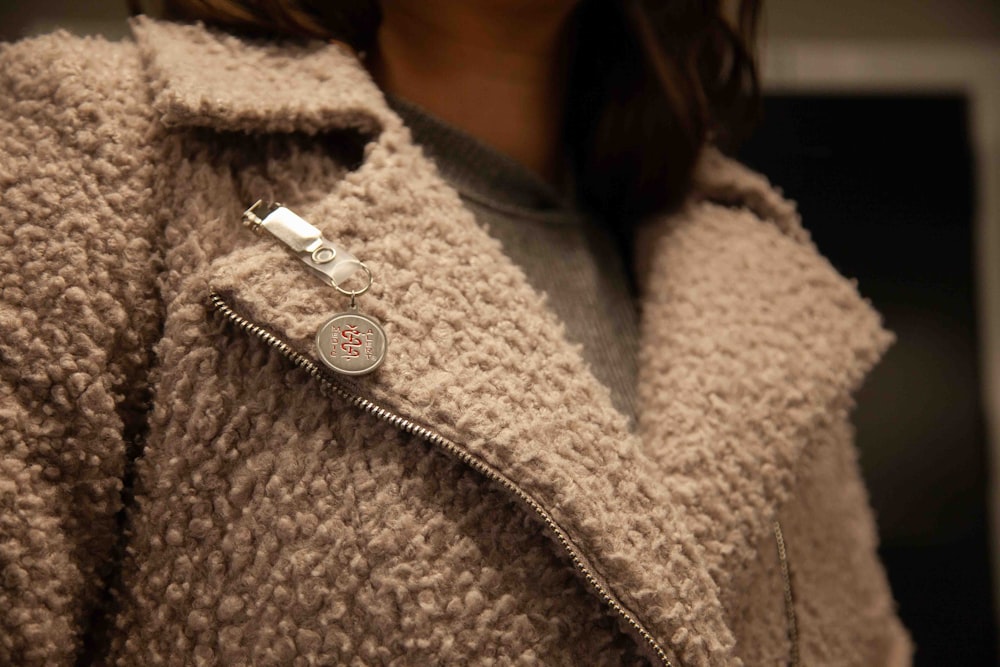 woman in brown zip up jacket