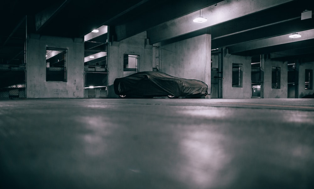 grayscale photo of a train station