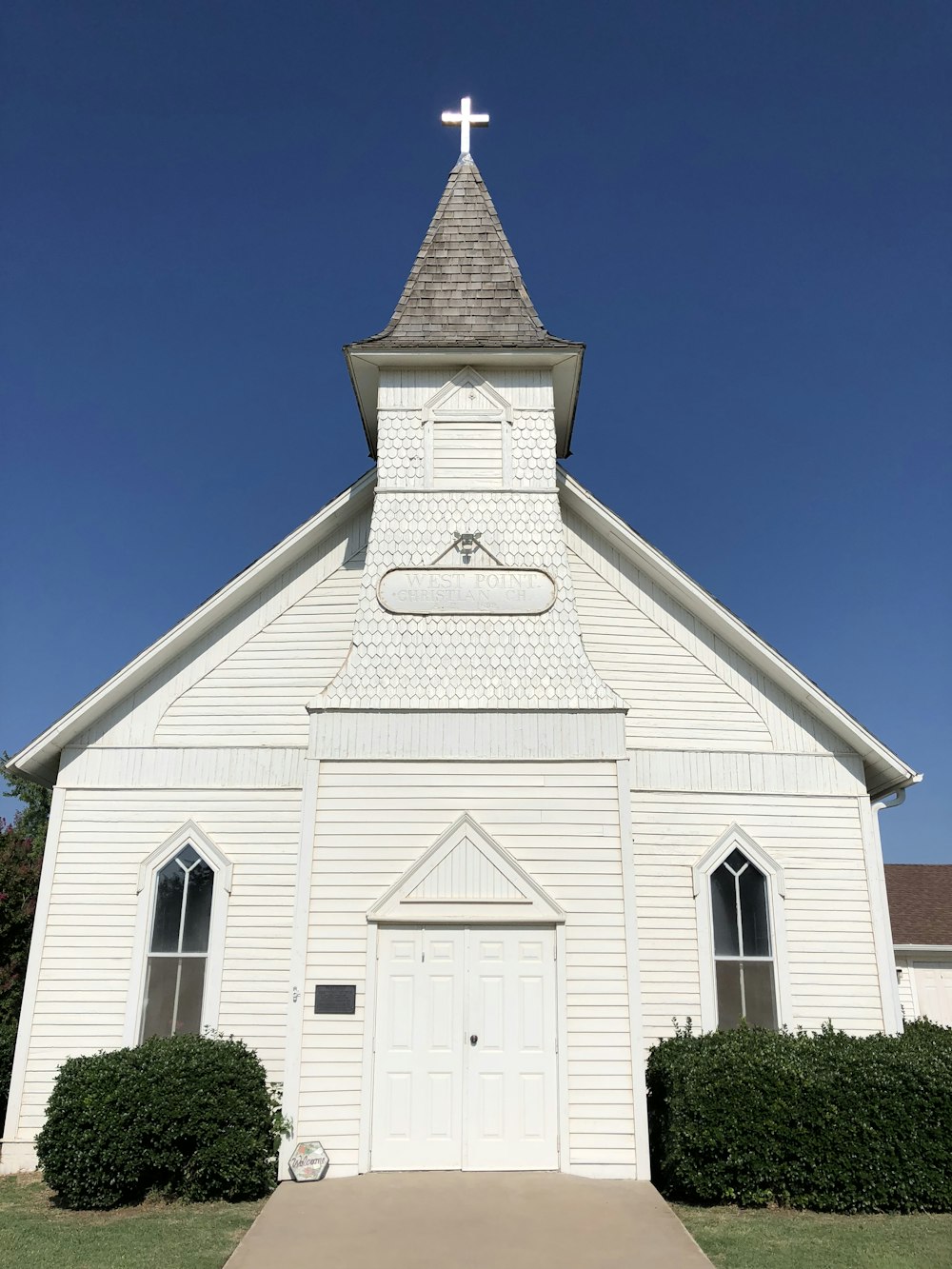 white concrete church under blue sky during daytime