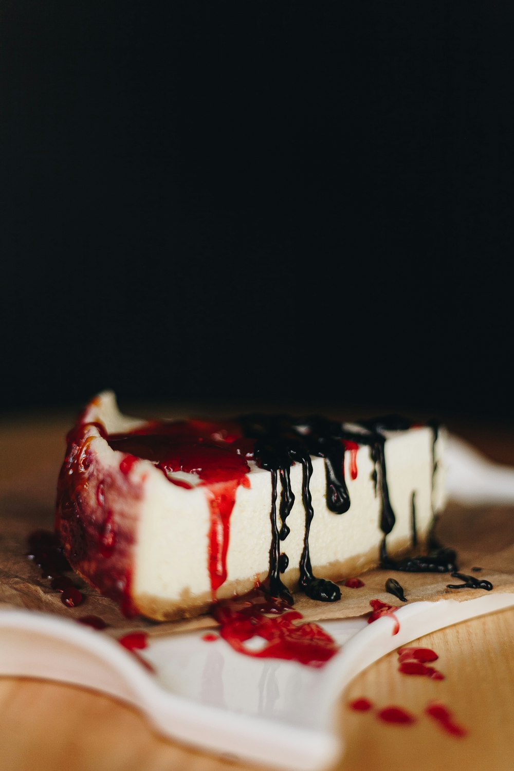 white and red cake on white ceramic plate