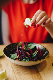 vegetable salad on brown ceramic bowl