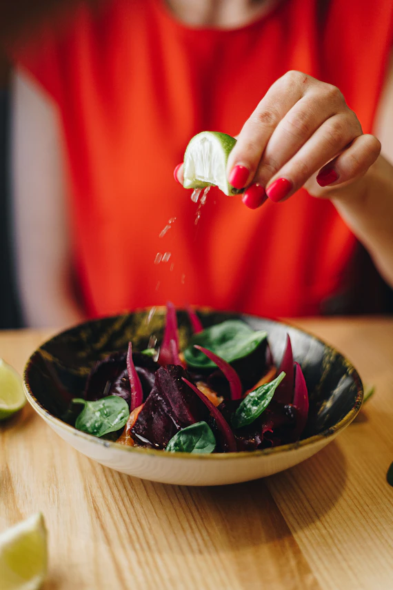 vegetable salad on brown ceramic bowl