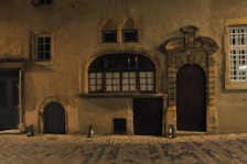 Historic stone facade of the Antica Veglie monolocale in the old town center.