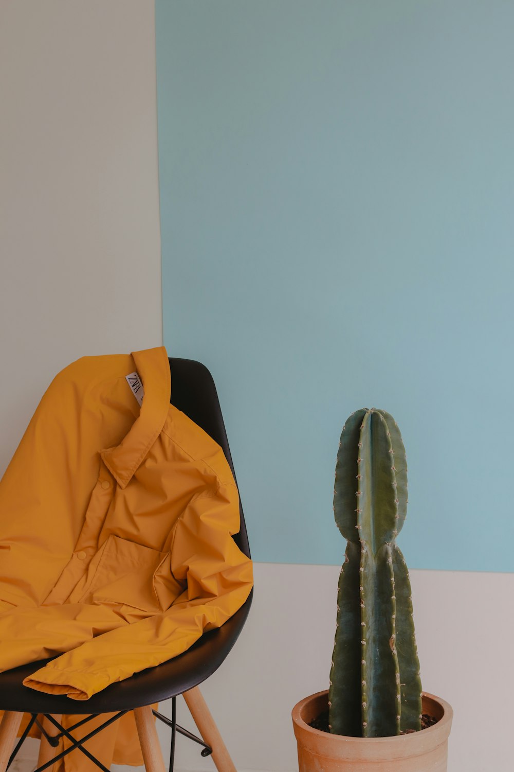 yellow and black backpack on black chair