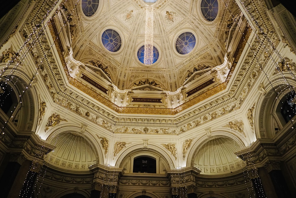 low angle photography of brown and white ceiling