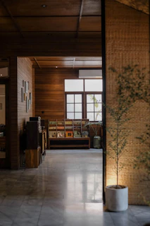 brown wooden desk near brown wooden door