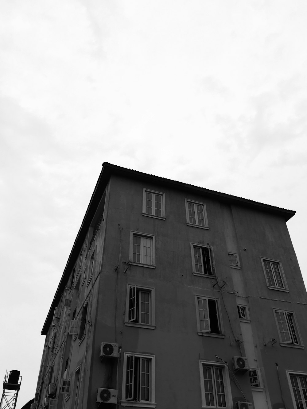 grayscale photo of concrete building