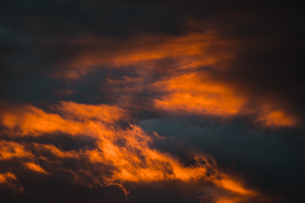 orange and black clouds during sunset