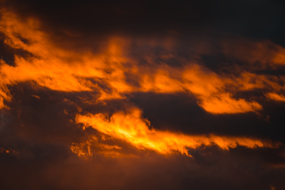 orange and black clouds during sunset