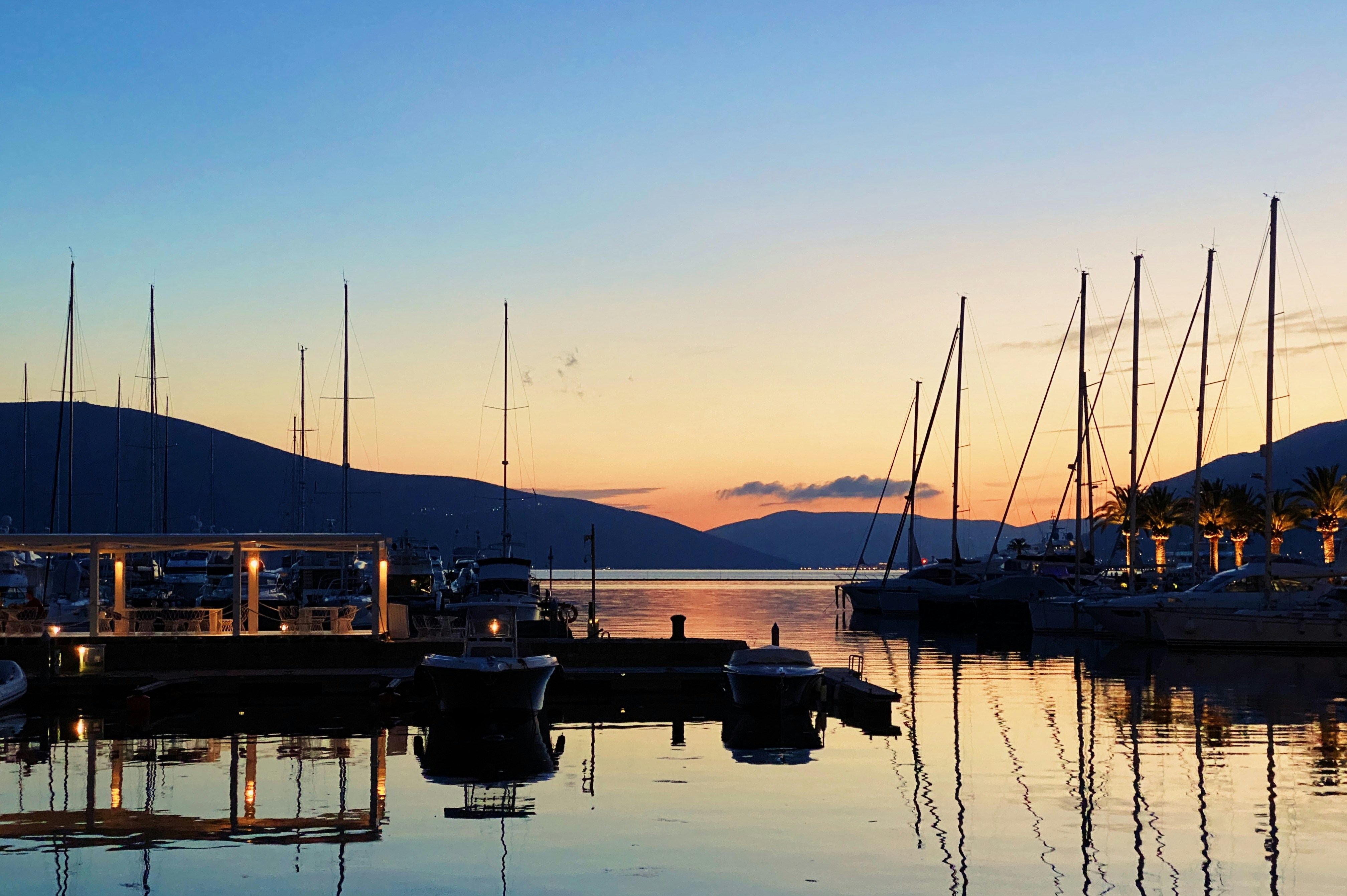 boat on dock during sunset, 