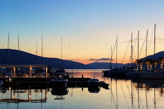 boat on dock during sunset
