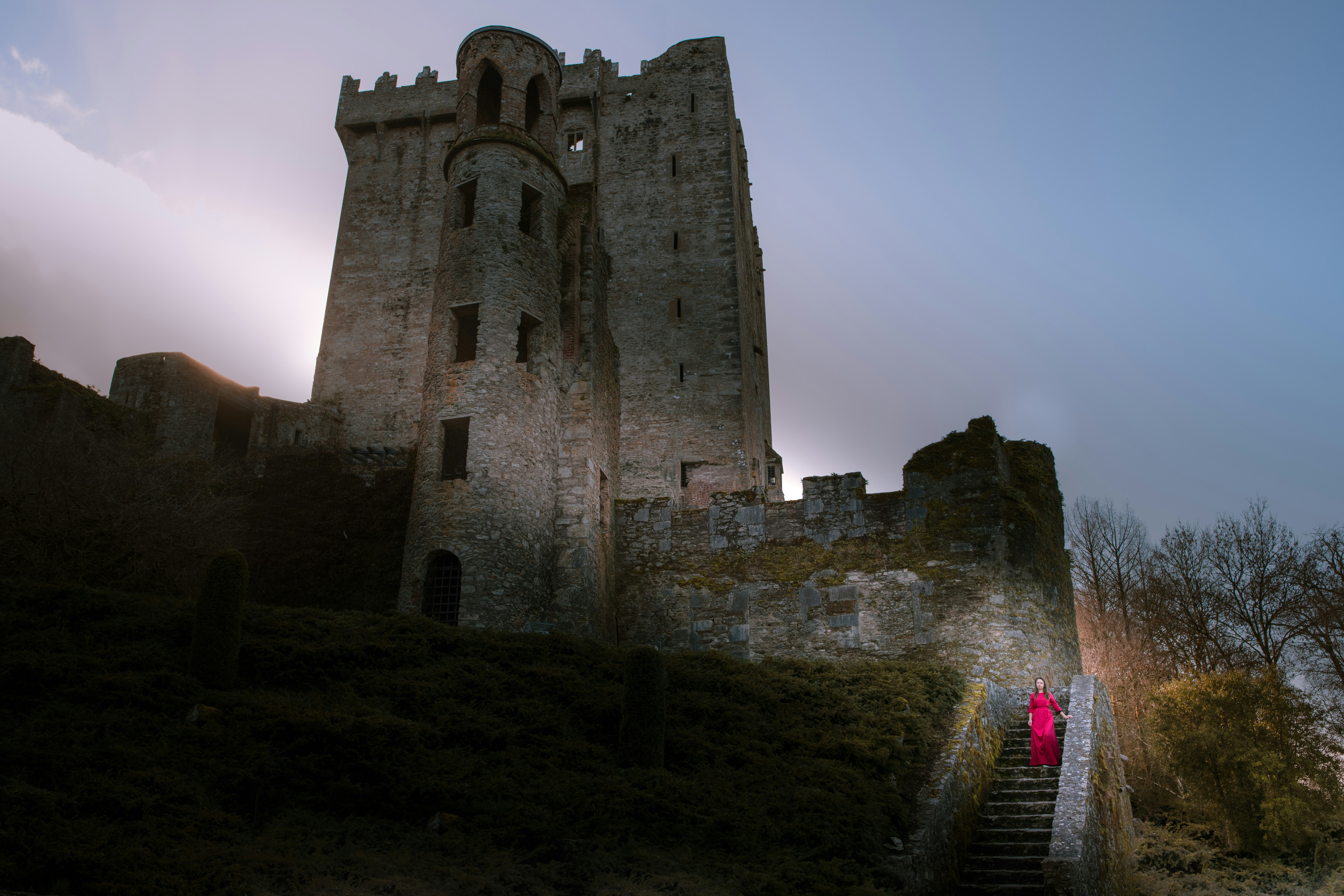 Woman in a red dress in Blarney Castle, Cork, Ireland
