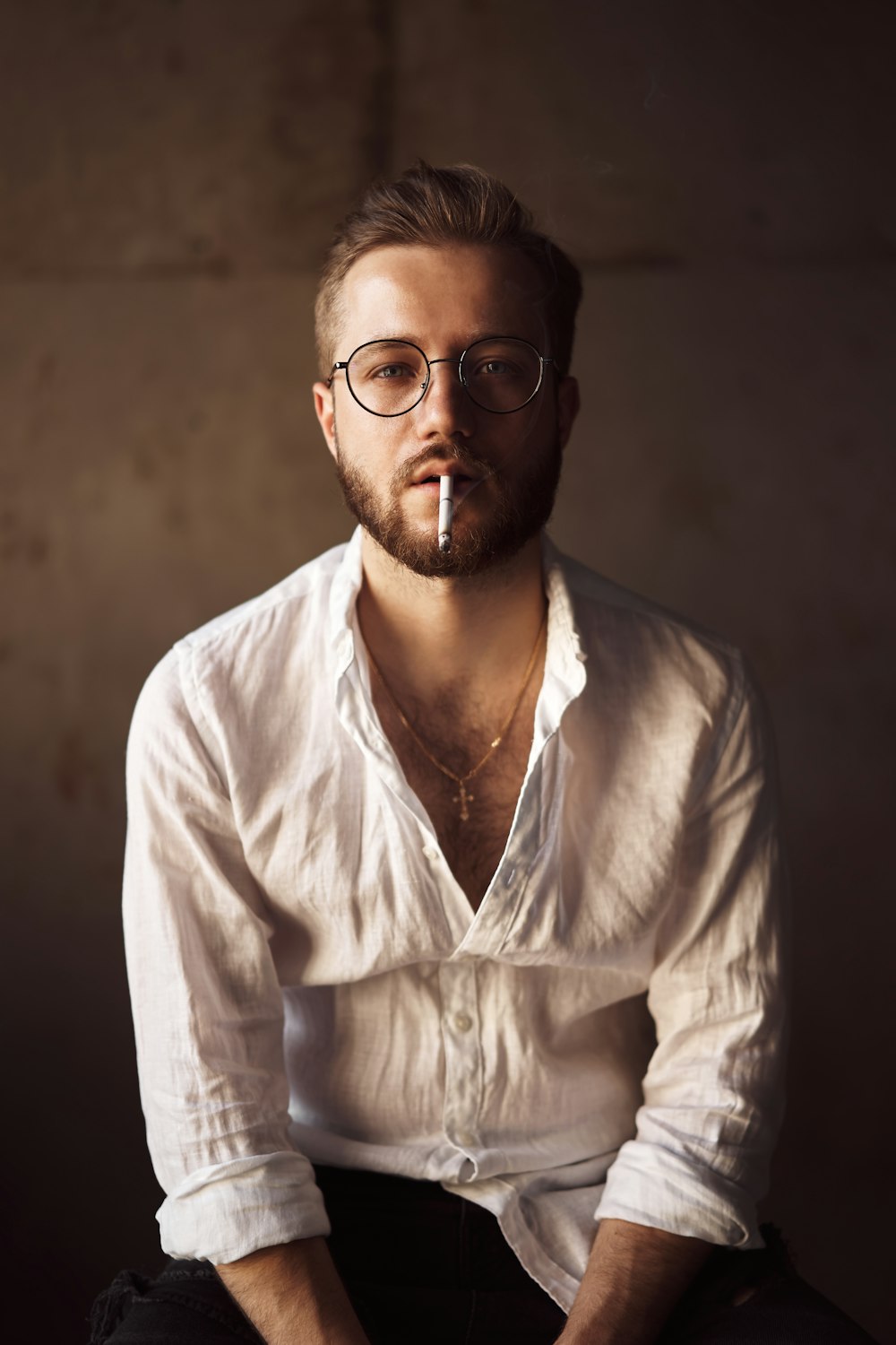 man in white dress shirt wearing black framed eyeglasses