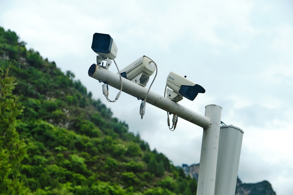 white and black security camera