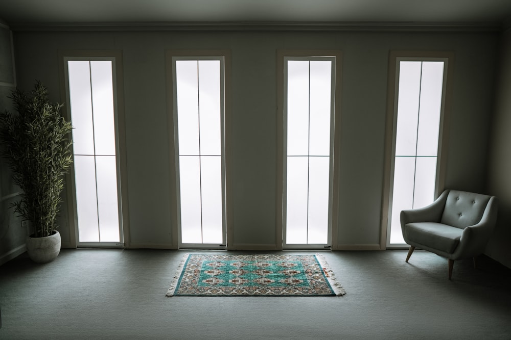 white and black area rug on brown wooden floor