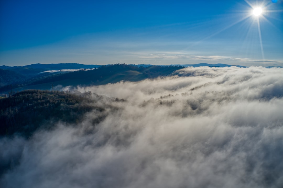 white clouds over the mountains