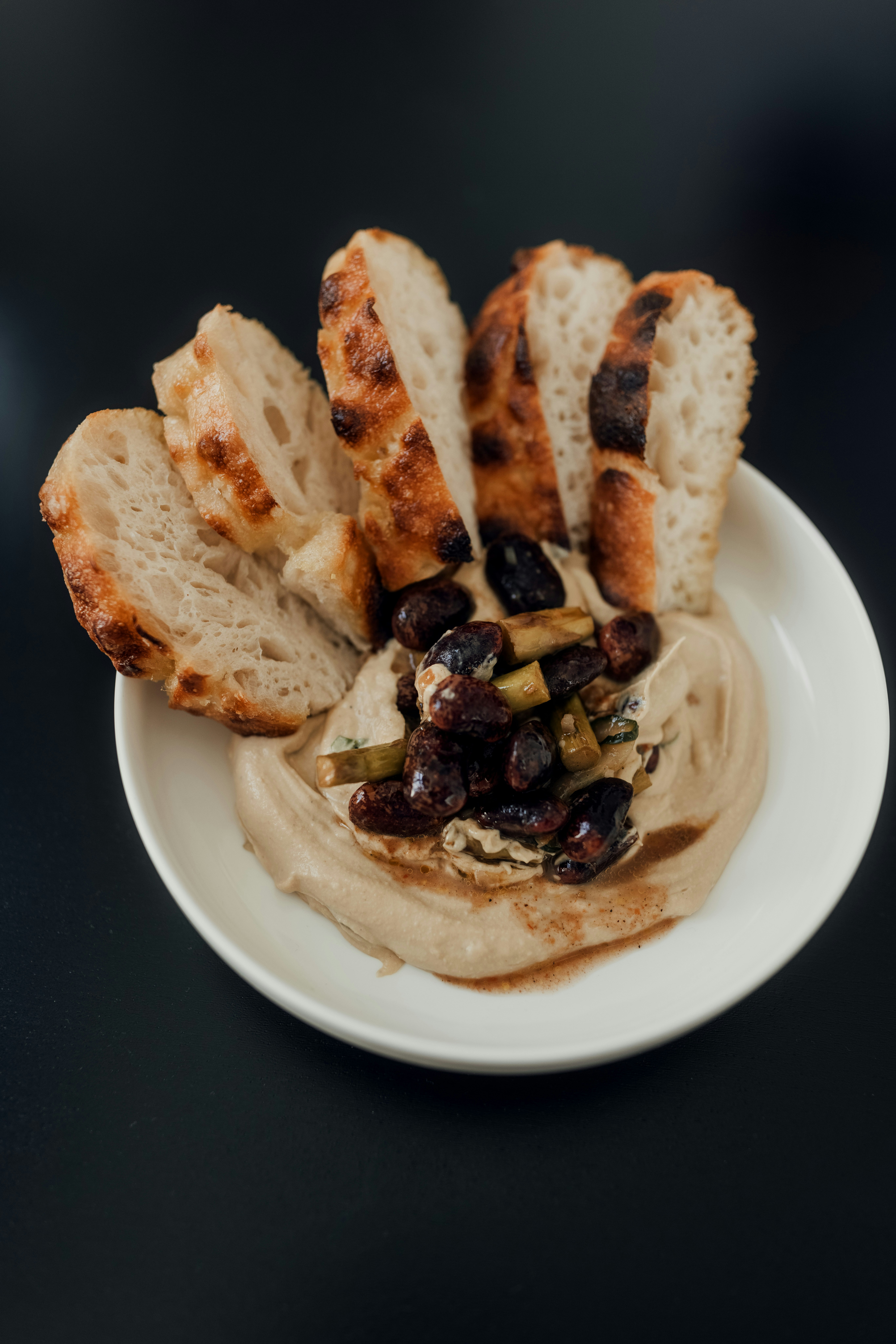 bread on white ceramic plate