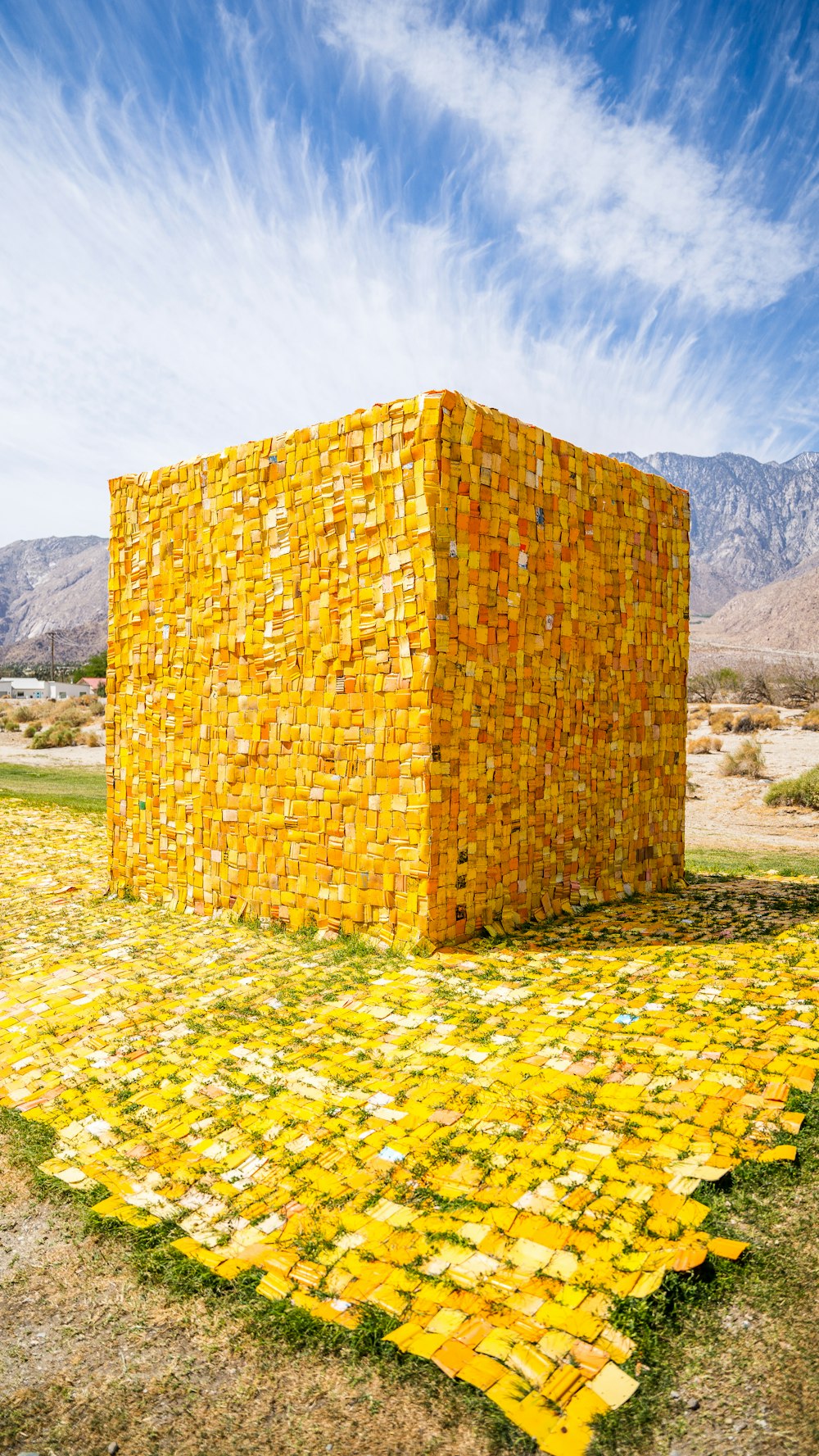 brown brick wall on green grass field