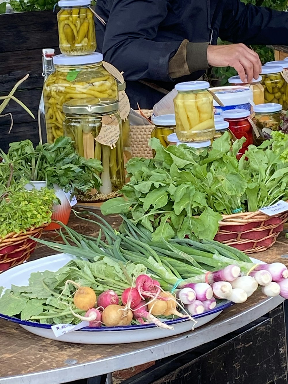 green and red chili peppers on brown wooden crate