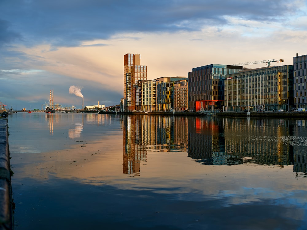 city skyline across body of water during daytime